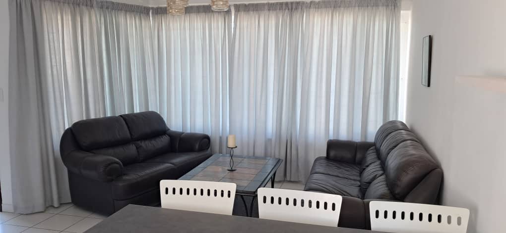 Lumen Street No. 6 lounge and dining area